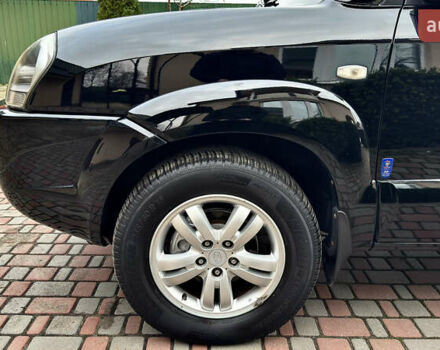 Чорний Хендай Туксон, об'ємом двигуна 2 л та пробігом 182 тис. км за 8299 $, фото 84 на Automoto.ua