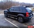 Черный Хендай Туксон, объемом двигателя 2 л и пробегом 140 тыс. км за 8200 $, фото 1 на Automoto.ua