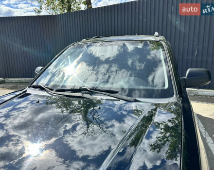 Чорний Хендай Туксон, об'ємом двигуна 1.98 л та пробігом 279 тис. км за 8200 $, фото 10 на Automoto.ua