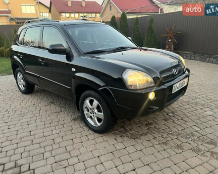 Черный Хендай Туксон, объемом двигателя 2 л и пробегом 276 тыс. км за 7450 $, фото 7 на Automoto.ua