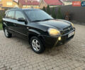 Черный Хендай Туксон, объемом двигателя 2 л и пробегом 276 тыс. км за 7450 $, фото 7 на Automoto.ua