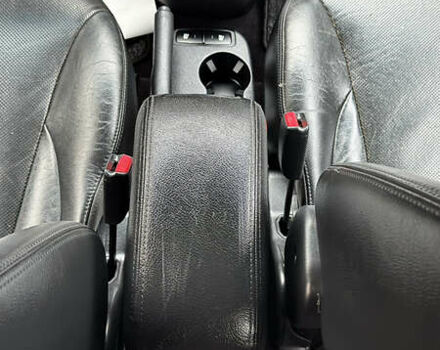 Чорний Хендай Туксон, об'ємом двигуна 2 л та пробігом 182 тис. км за 8299 $, фото 57 на Automoto.ua