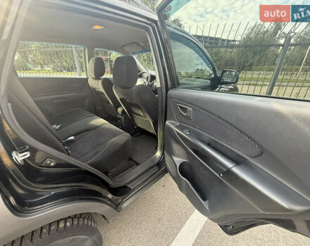 Черный Хендай Туксон, объемом двигателя 2 л и пробегом 218 тыс. км за 6700 $, фото 10 на Automoto.ua