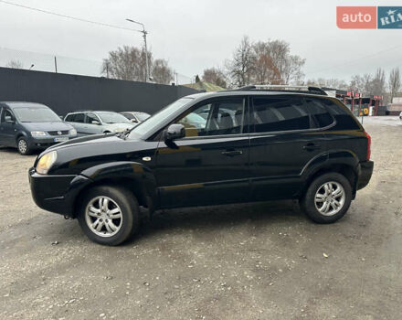 Чорний Хендай Туксон, об'ємом двигуна 2 л та пробігом 243 тис. км за 7999 $, фото 8 на Automoto.ua