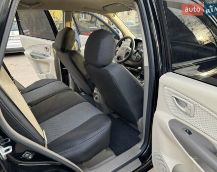 Черный Хендай Туксон, объемом двигателя 1.98 л и пробегом 196 тыс. км за 7999 $, фото 17 на Automoto.ua