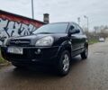 Черный Хендай Туксон, объемом двигателя 2 л и пробегом 190 тыс. км за 1843 $, фото 1 на Automoto.ua
