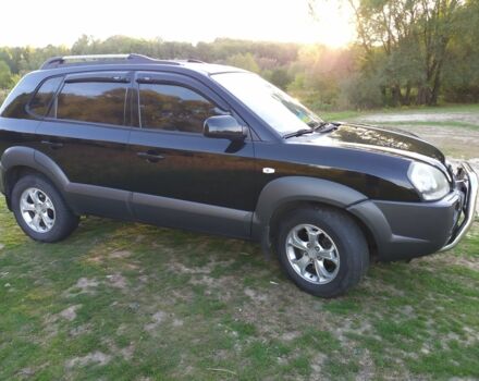 Черный Хендай Туксон, объемом двигателя 2 л и пробегом 162 тыс. км за 8500 $, фото 15 на Automoto.ua