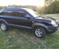 Черный Хендай Туксон, объемом двигателя 2 л и пробегом 162 тыс. км за 8500 $, фото 15 на Automoto.ua