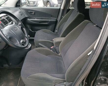 Черный Хендай Туксон, объемом двигателя 2 л и пробегом 192 тыс. км за 7990 $, фото 19 на Automoto.ua