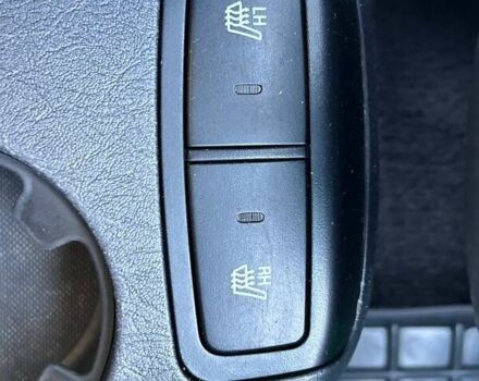 Черный Хендай Туксон, объемом двигателя 2 л и пробегом 230 тыс. км за 7500 $, фото 24 на Automoto.ua