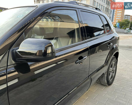 Чорний Хендай Туксон, об'ємом двигуна 1.98 л та пробігом 185 тис. км за 7199 $, фото 35 на Automoto.ua