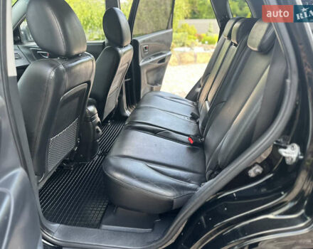 Черный Хендай Туксон, объемом двигателя 2 л и пробегом 218 тыс. км за 8700 $, фото 33 на Automoto.ua