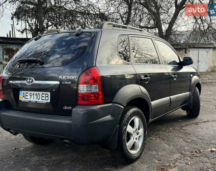 Чорний Хендай Туксон, об'ємом двигуна 2 л та пробігом 240 тис. км за 8500 $, фото 5 на Automoto.ua