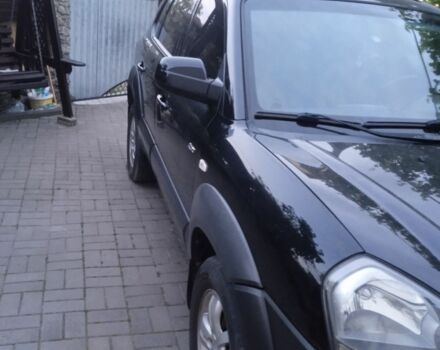 Черный Хендай Туксон, объемом двигателя 2 л и пробегом 209 тыс. км за 8200 $, фото 2 на Automoto.ua