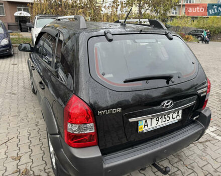 Черный Хендай Туксон, объемом двигателя 2 л и пробегом 157 тыс. км за 8900 $, фото 10 на Automoto.ua