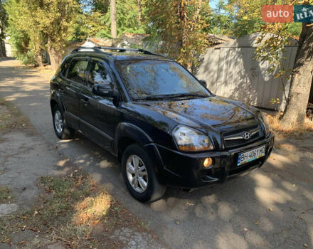 Черный Хендай Туксон, объемом двигателя 1.98 л и пробегом 260 тыс. км за 7777 $, фото 7 на Automoto.ua