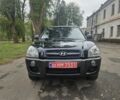 Чорний Хендай Туксон, об'ємом двигуна 2 л та пробігом 186 тис. км за 8300 $, фото 2 на Automoto.ua