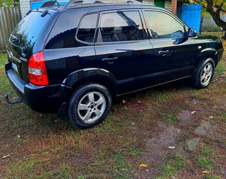 Черный Хендай Туксон, объемом двигателя 2 л и пробегом 187 тыс. км за 7900 $, фото 5 на Automoto.ua