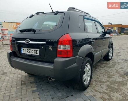 Чорний Хендай Туксон, об'ємом двигуна 2 л та пробігом 225 тис. км за 8000 $, фото 7 на Automoto.ua