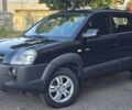 Чорний Хендай Туксон, об'ємом двигуна 1.98 л та пробігом 215 тис. км за 8350 $, фото 1 на Automoto.ua