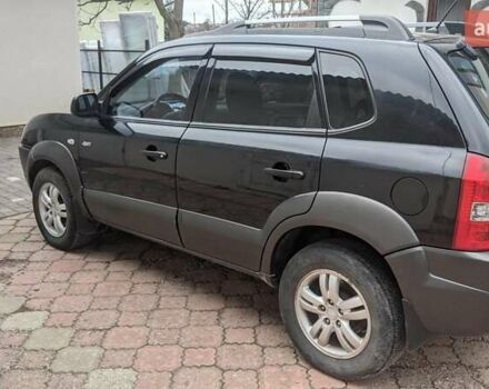 Черный Хендай Туксон, объемом двигателя 2 л и пробегом 163 тыс. км за 8100 $, фото 13 на Automoto.ua