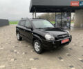 Черный Хендай Туксон, объемом двигателя 2 л и пробегом 198 тыс. км за 7500 $, фото 1 на Automoto.ua