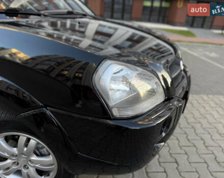 Чорний Хендай Туксон, об'ємом двигуна 2 л та пробігом 156 тис. км за 7850 $, фото 42 на Automoto.ua