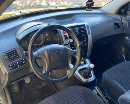 Черный Хендай Туксон, объемом двигателя 1.98 л и пробегом 218 тыс. км за 7200 $, фото 18 на Automoto.ua