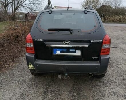 Черный Хендай Туксон, объемом двигателя 2 л и пробегом 276 тыс. км за 8500 $, фото 3 на Automoto.ua