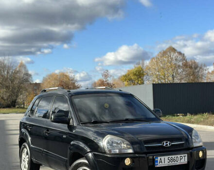 Черный Хендай Туксон, объемом двигателя 2 л и пробегом 300 тыс. км за 8300 $, фото 4 на Automoto.ua