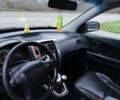 Черный Хендай Туксон, объемом двигателя 2 л и пробегом 230 тыс. км за 8000 $, фото 8 на Automoto.ua