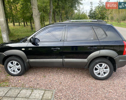Чорний Хендай Туксон, об'ємом двигуна 2 л та пробігом 160 тис. км за 8800 $, фото 7 на Automoto.ua
