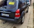 Чорний Хендай Туксон, об'ємом двигуна 2 л та пробігом 154 тис. км за 8700 $, фото 4 на Automoto.ua