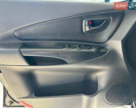 Черный Хендай Туксон, объемом двигателя 2.7 л и пробегом 158 тыс. км за 7940 $, фото 19 на Automoto.ua