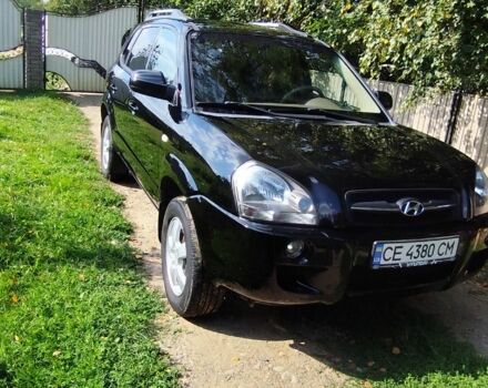 Черный Хендай Туксон, объемом двигателя 2 л и пробегом 224 тыс. км за 8000 $, фото 15 на Automoto.ua
