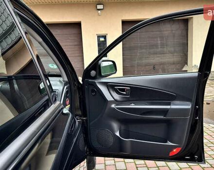 Чорний Хендай Туксон, об'ємом двигуна 2 л та пробігом 182 тис. км за 8299 $, фото 36 на Automoto.ua