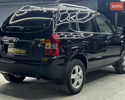 Чорний Хендай Туксон, об'ємом двигуна 1.98 л та пробігом 224 тис. км за 7800 $, фото 5 на Automoto.ua