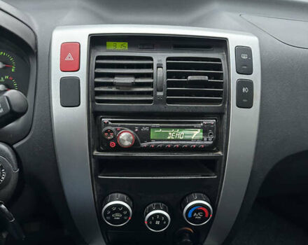 Черный Хендай Туксон, объемом двигателя 2 л и пробегом 136 тыс. км за 8500 $, фото 20 на Automoto.ua