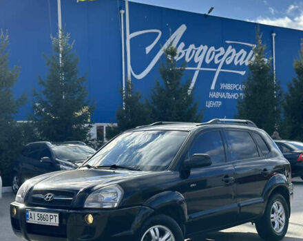 Черный Хендай Туксон, объемом двигателя 2 л и пробегом 300 тыс. км за 8300 $, фото 1 на Automoto.ua