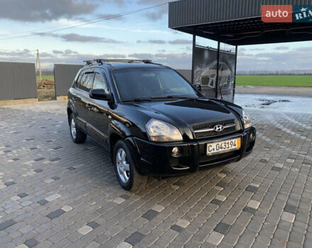 Черный Хендай Туксон, объемом двигателя 2 л и пробегом 212 тыс. км за 7600 $, фото 1 на Automoto.ua