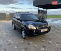 Черный Хендай Туксон, объемом двигателя 2 л и пробегом 212 тыс. км за 7600 $, фото 1 на Automoto.ua