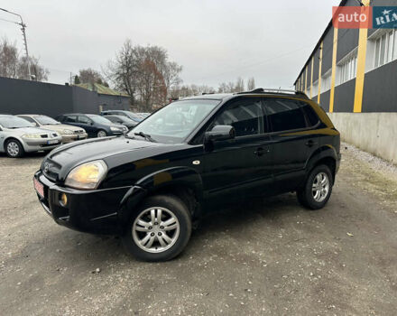 Чорний Хендай Туксон, об'ємом двигуна 2 л та пробігом 243 тис. км за 7999 $, фото 5 на Automoto.ua