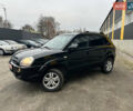 Чорний Хендай Туксон, об'ємом двигуна 2 л та пробігом 243 тис. км за 7999 $, фото 5 на Automoto.ua