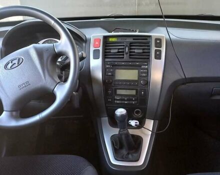 Чорний Хендай Туксон, об'ємом двигуна 2 л та пробігом 162 тис. км за 8800 $, фото 1 на Automoto.ua