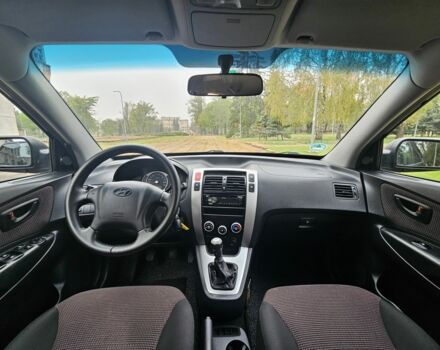 Чорний Хендай Туксон, об'ємом двигуна 2 л та пробігом 186 тис. км за 8300 $, фото 12 на Automoto.ua