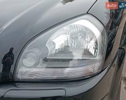 Черный Хендай Туксон, объемом двигателя 2 л и пробегом 192 тыс. км за 7990 $, фото 4 на Automoto.ua