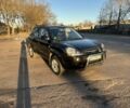 Черный Хендай Туксон, объемом двигателя 2 л и пробегом 205 тыс. км за 8400 $, фото 1 на Automoto.ua