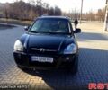 Черный Хендай Туксон, объемом двигателя 2 л и пробегом 240 тыс. км за 8000 $, фото 3 на Automoto.ua