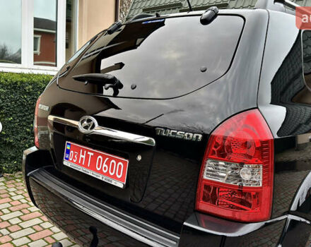 Чорний Хендай Туксон, об'ємом двигуна 2 л та пробігом 182 тис. км за 8299 $, фото 15 на Automoto.ua