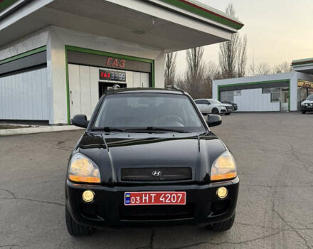 Черный Хендай Туксон, объемом двигателя 2 л и пробегом 210 тыс. км за 7850 $, фото 3 на Automoto.ua